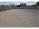 Expansive backyard with gravel awaiting your custom landscaping ideas at 18361 E Eloisa Dr, Gold Canyon, AZ 85118