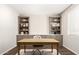 Well-appointed home office with custom built-ins and ample storage space at 19595 W San Miguel Ave, Litchfield Park, AZ 85340