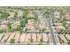 High angle showcases houses in the area with green spaces and roads at 20699 W Ridge Rd, Buckeye, AZ 85396