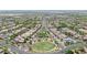 Aerial view showcases the neighborhood with parks and green spaces at 20699 W Ridge Rd, Buckeye, AZ 85396