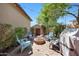 This tranquil backyard has comfortable seating and a charming fire pit for relaxing outdoor gatherings at 20699 W Ridge Rd, Buckeye, AZ 85396