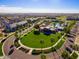 Aerial image showcasing the community pool, recreational area, and well-maintained neighborhood landscaping at 20699 W Ridge Rd, Buckeye, AZ 85396