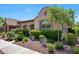 Beautiful single-story home with a landscaped front yard and desert plants at 20699 W Ridge Rd, Buckeye, AZ 85396