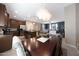 Open-concept kitchen and dining area flow into the living room, creating an inviting space at 20699 W Ridge Rd, Buckeye, AZ 85396