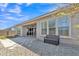Backyard with artificial turf, covered patio and seating area at 22218 N 28Th St, Phoenix, AZ 85050