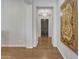 Inviting entryway featuring hardwood floors, chandelier, and views of the front door at 22218 N 28Th St, Phoenix, AZ 85050