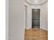 Inviting entryway with wood flooring, a stylish light fixture, and neutral-toned walls at 22218 N 28Th St, Phoenix, AZ 85050