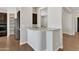 Stylish kitchen features a breakfast bar with granite countertop and stainless steel appliances at 22218 N 28Th St, Phoenix, AZ 85050