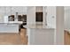 Spacious kitchen with dark cabinetry and modern appliances at 22218 N 28Th St, Phoenix, AZ 85050