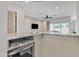 Open concept living room with a marble countertop and a view to the outdoors at 22218 N 28Th St, Phoenix, AZ 85050