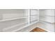 Walk-in pantry features organized shelving and ample storage space at 22218 N 28Th St, Phoenix, AZ 85050