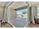 Covered patio perfect for outdoor seating and entertaining with tile flooring and desert landscaping at 22218 N 28Th St, Phoenix, AZ 85050