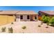 Well-maintained backyard featuring desert landscaping and a covered patio area at 2250 E Deer Valley Rd # 96, Phoenix, AZ 85024