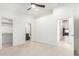 Spacious bedroom with tile floors and a walk-in closet leading to an ensuite bathroom at 2250 E Deer Valley Rd # 96, Phoenix, AZ 85024