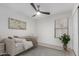 Bright bedroom with a ceiling fan, window, and day bed at 2250 E Deer Valley Rd # 96, Phoenix, AZ 85024