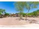 Welcoming community entrance with decorative trees and well-maintained landscaping at 2250 E Deer Valley Rd # 96, Phoenix, AZ 85024