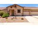 Charming home featuring desert landscaping, a tile roof, and an attached two-car garage at 2250 E Deer Valley Rd # 96, Phoenix, AZ 85024