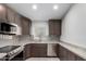Modern kitchen featuring stainless steel appliances, a stylish backsplash, and plenty of counter space at 2250 E Deer Valley Rd # 96, Phoenix, AZ 85024