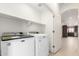 Bright laundry room features a washer, dryer and neutral colors at 2250 E Deer Valley Rd # 96, Phoenix, AZ 85024