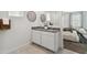 Clean bathroom with dual sink vanity, granite countertops, and decorative wall art at 2255 W Sheridan Ave, Apache Junction, AZ 85120