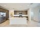 Modern kitchen featuring a large island, stainless steel appliances, and ample cabinet space at 25188 N 174Th Ave, Surprise, AZ 85387