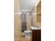 This updated bathroom features modern fixtures, a shower, and ample lighting for a clean and functional space at 2636 N Dayton St, Phoenix, AZ 85006