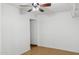 Bedroom with ceiling fan and tile floors; additional room visible at 2636 N Dayton St, Phoenix, AZ 85006