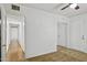 Bedroom with multiple doors, carpet and hallway access at 2636 N Dayton St, Phoenix, AZ 85006