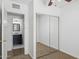 Bedroom with mirrored closet doors and ensuite bathroom at 2636 N Dayton St, Phoenix, AZ 85006