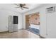 Bright dining area featuring a modern refrigerator, glass shelving, and sliding door access at 2636 N Dayton St, Phoenix, AZ 85006