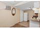 A functional kitchen features essential appliances, an oval mirror, and tiled floors for easy maintenance at 2636 N Dayton St, Phoenix, AZ 85006