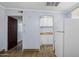 Functional kitchenette with new white cabinets and appliances at 2636 N Dayton St, Phoenix, AZ 85006