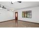 Bright living space with tile floors, a ceiling fan, front door, and a window at 2636 N Dayton St, Phoenix, AZ 85006