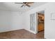 Spacious living room with tile floors, ceiling fan and view of sink area at 2636 N Dayton St, Phoenix, AZ 85006