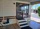 This patio is an entry with a chair and access to the home, providing a functional area at 2656 N 56Th St # C160, Mesa, AZ 85215