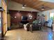 Spacious lounge area featuring comfortable seating, entertainment center, and charming decor, perfect for relaxation and socializing at 2656 N 56Th St # C160, Mesa, AZ 85215