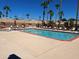 Inviting swimming pool with clear turquoise water, perfect for swimming, relaxation, and outdoor enjoyment in a serene setting at 2656 N 56Th St # C160, Mesa, AZ 85215