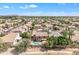 Spacious Gathering home with a large backyard featuring a sparkling pool, perfect for outdoor entertaining at 308 E Sheffield Ct, Gilbert, AZ 85296