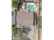 An aerial view showcases the home's layout, highlighting its backyard oasis with a sparkling pool and ample space at 308 E Sheffield Ct, Gilbert, AZ 85296