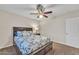Bedroom featuring a ceiling fan and a bed at 308 E Sheffield Ct, Gilbert, AZ 85296