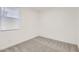 Simple bedroom with neutral walls and carpet, window with blinds at 3129 S 155Th Ln, Goodyear, AZ 85338