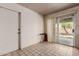 Bright dining area featuring tile flooring and sliding door to a covered patio at 3226 W Grovers Ave, Phoenix, AZ 85053