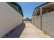 Long driveway offers ample parking space leading to the backyard, ensuring convenience at 3226 W Grovers Ave, Phoenix, AZ 85053