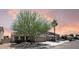 Charming home featuring a well-manicured yard, desert landscaping and tile roof at 351 N Newport St, Chandler, AZ 85225