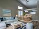 Inviting living room with vaulted ceiling, beach themed decor and lots of light at 351 N Newport St, Chandler, AZ 85225