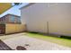Enclosed patio features pavers, gravel, and artificial grass for easy care at 3514 S Posse Trl, Gilbert, AZ 85297