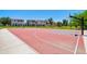 Community basketball court surrounded by well-maintained landscaping, promoting an active lifestyle at 3514 S Posse Trl, Gilbert, AZ 85297