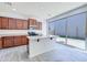 Well-equipped kitchen with center island, granite countertops, and ample cabinet space at 3514 S Posse Trl, Gilbert, AZ 85297