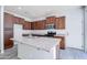 Open kitchen with a large island and ample cabinet storage space at 3514 S Posse Trl, Gilbert, AZ 85297