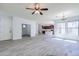 Inviting living room featuring a ceiling fan and an open floor plan at 3514 S Posse Trl, Gilbert, AZ 85297